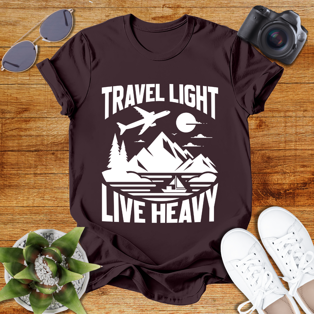 Travel Light Live Heavy Unisex Softstyle T-Shirt