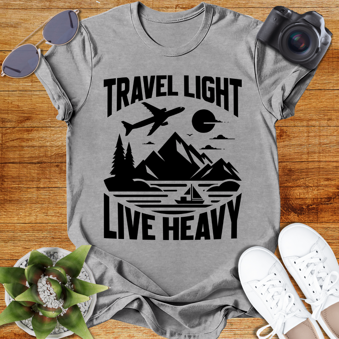 Travel Light Live Heavy Unisex Softstyle T-Shirt